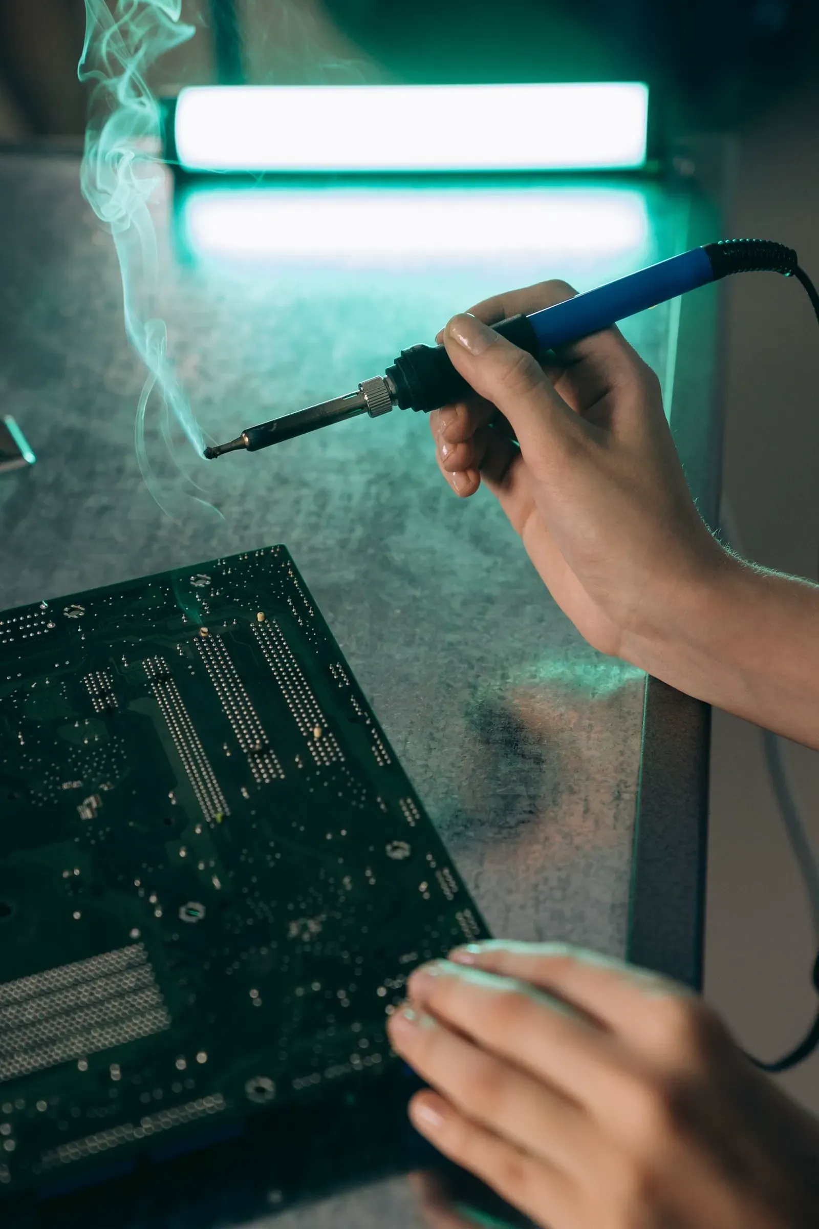 Circuit board being repaired in the Fisher Scales workshop Attleborough