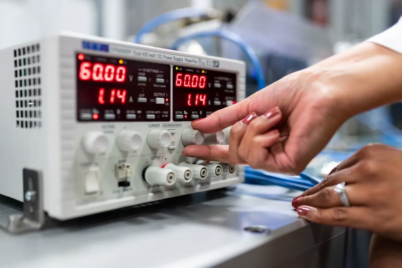 Engineer calibrating a precision measuring instrument Fisher Scales Attleborough