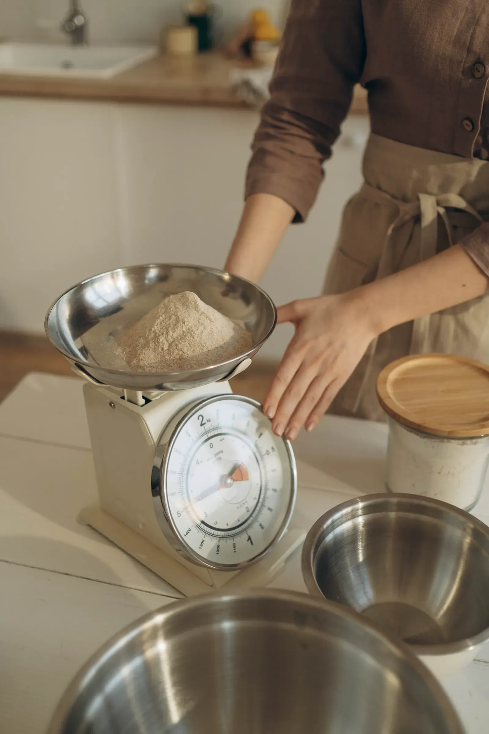 Ingredients being weighed on a mechanical scale Fisher Scales Norfolk