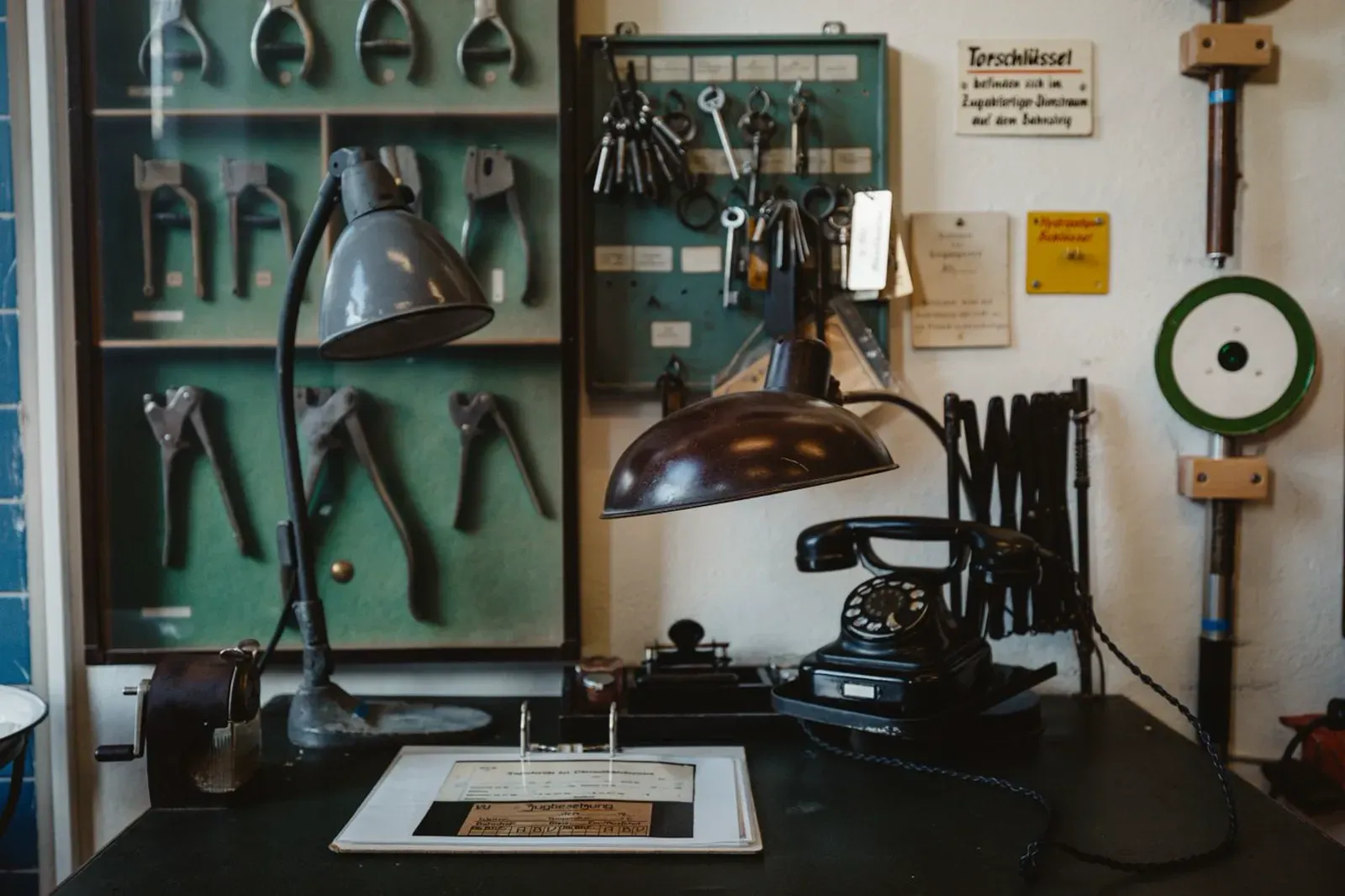Workshop desk with hand tools and telephone at Fisher Scales Attleborough Norfolk